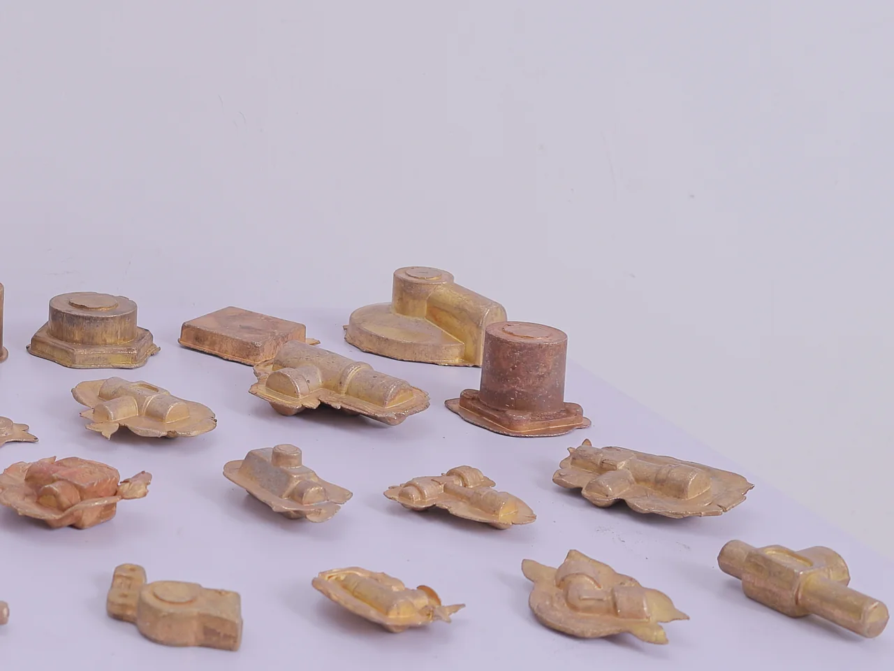 Hot-forged brass blanks — flanges, caps and tee bodies, close up